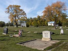 Griffin Creek Cemetery. There is a large plot of land with marked graves spread throughout. 